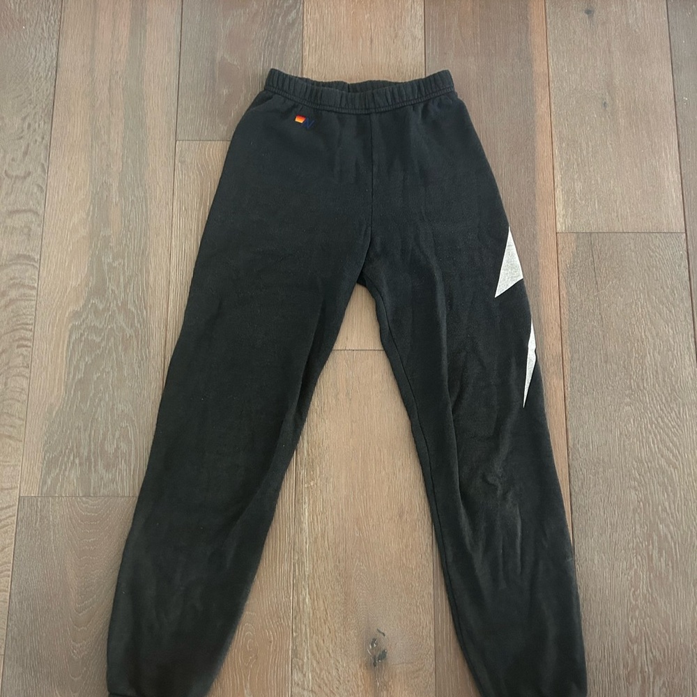 Aviator Nation black lightning bolt sweatpants.
